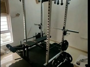 Power Rack With High And Low Pulleys