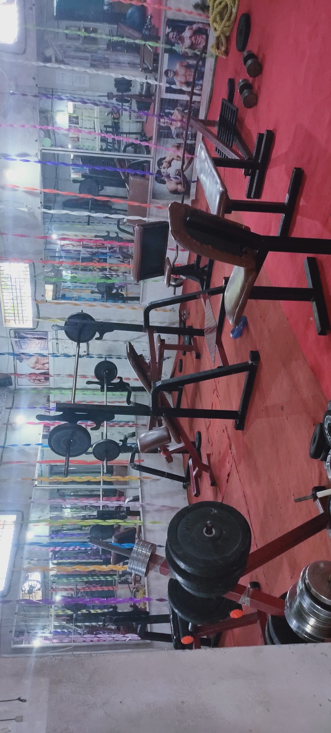 Well maintained gym equipment and 10 pis glass