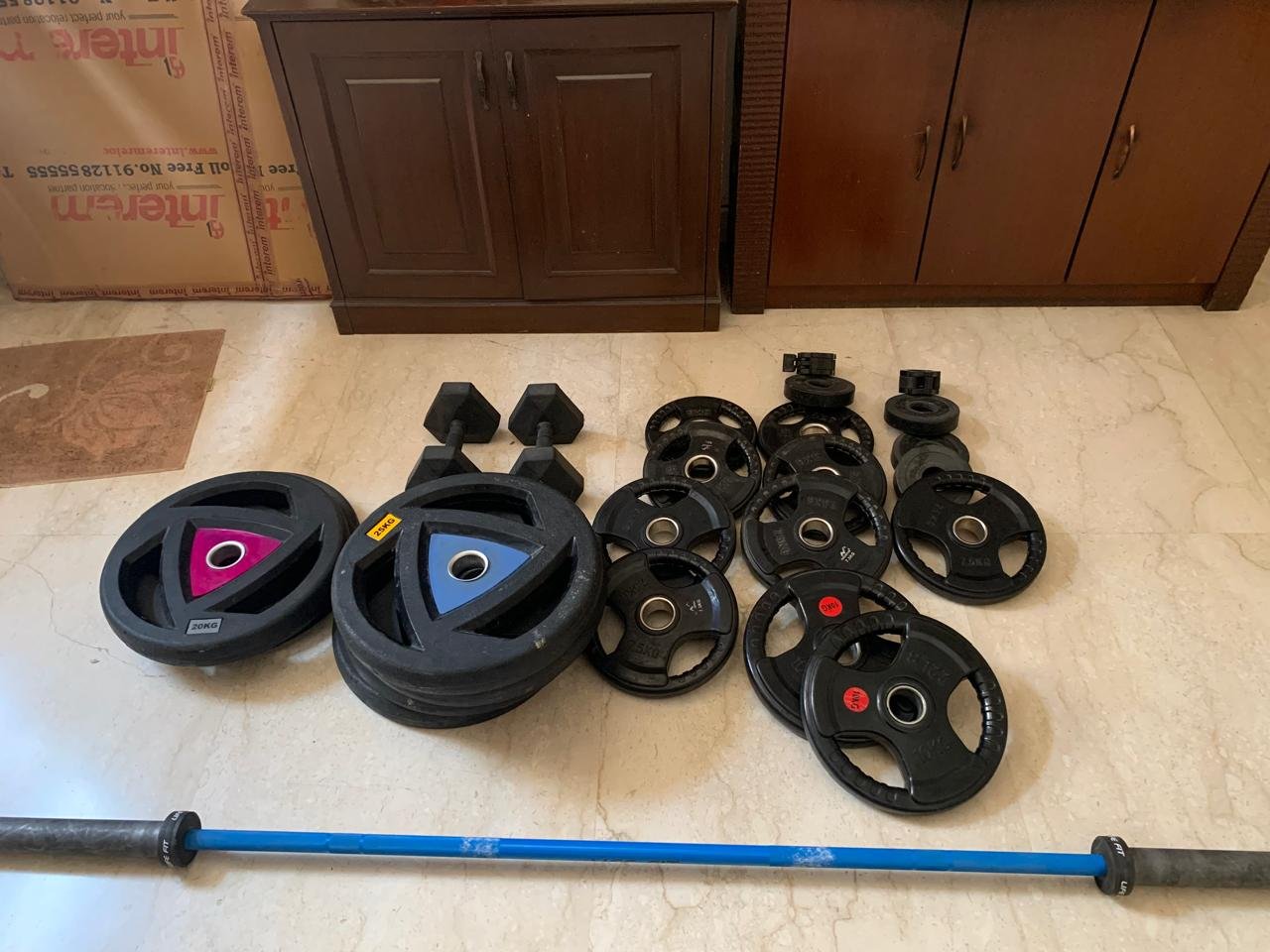 Weight plates + Olympic Barbell