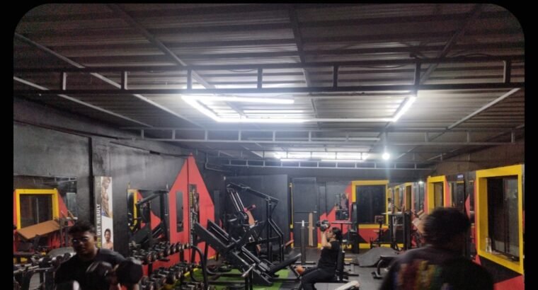 Two gym full gym equipment with mat and glass